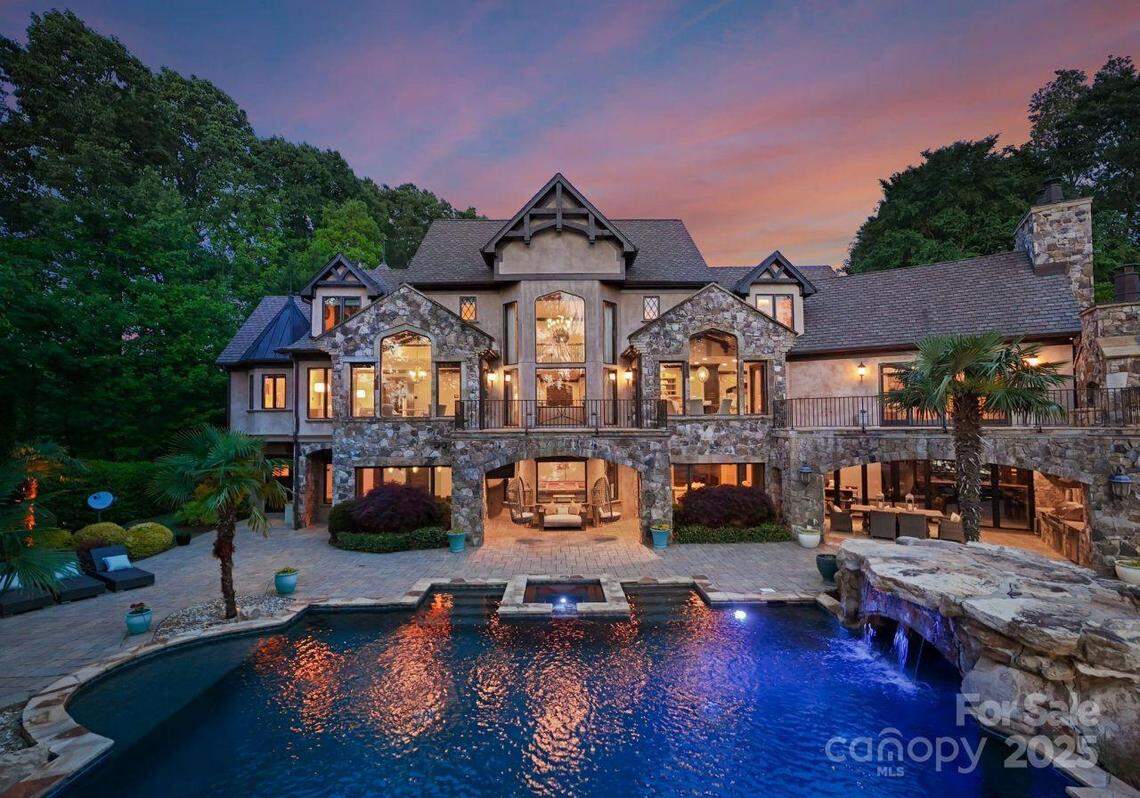 The 8,763-square-foot gated, European-style estate includes this outdoor pool.