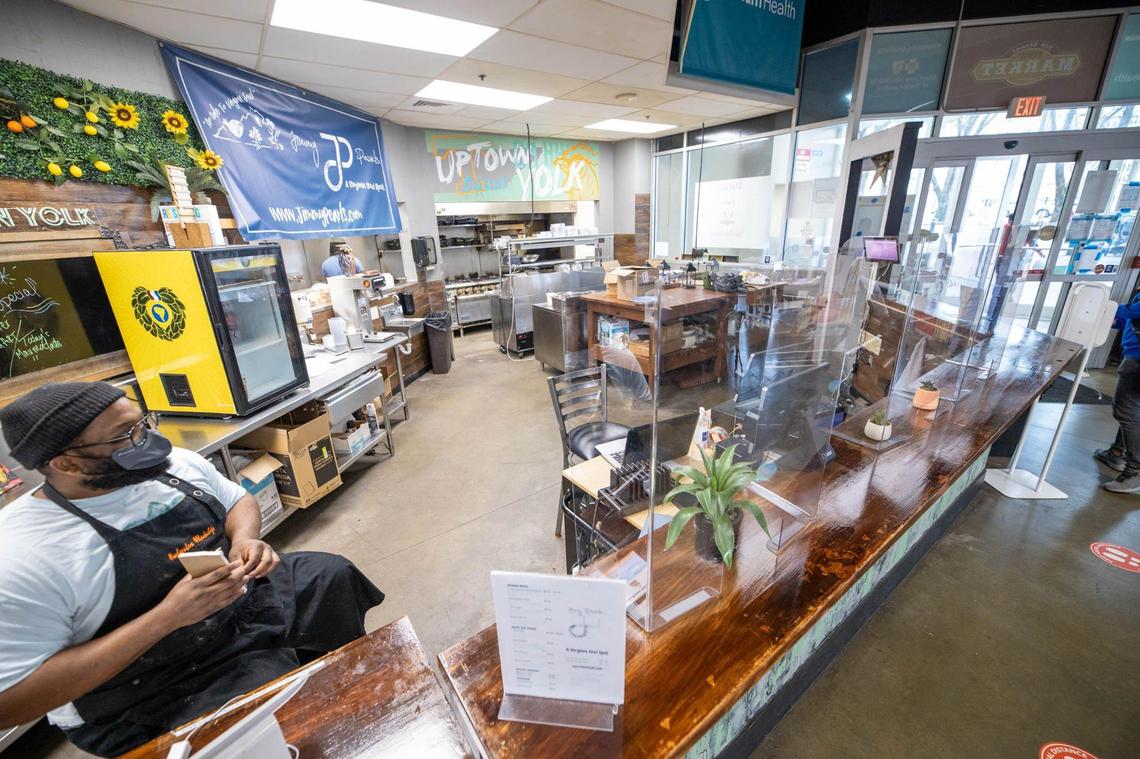 Daryl Cooper finishes taking an order at Jimmy Pearls on Friday, Feb. 26.