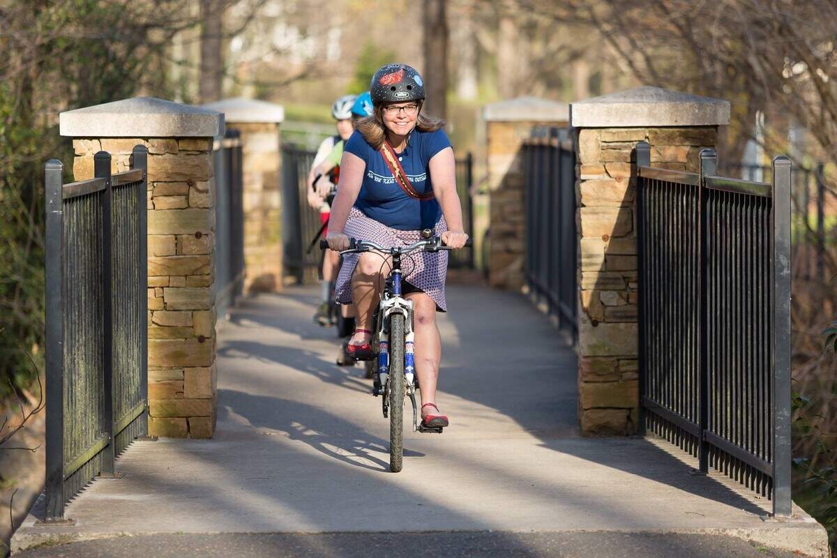 Bethanie Johnson of Charlotte was hit by a car, but that hasn’t stopped her love for bike riding.