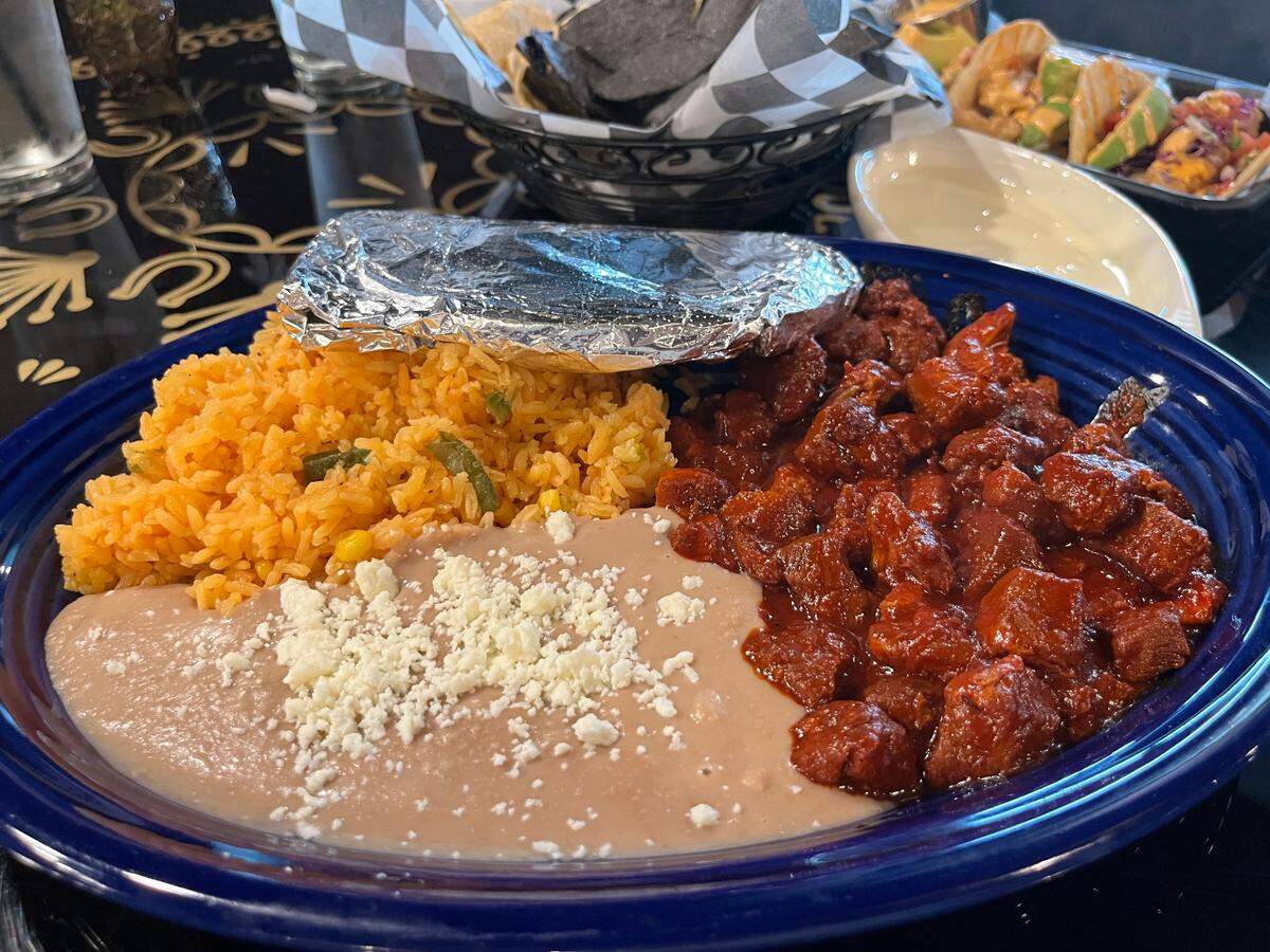 The asado de cerdo at Frida’s is pork in a rich chile ancho pepper sauce.
