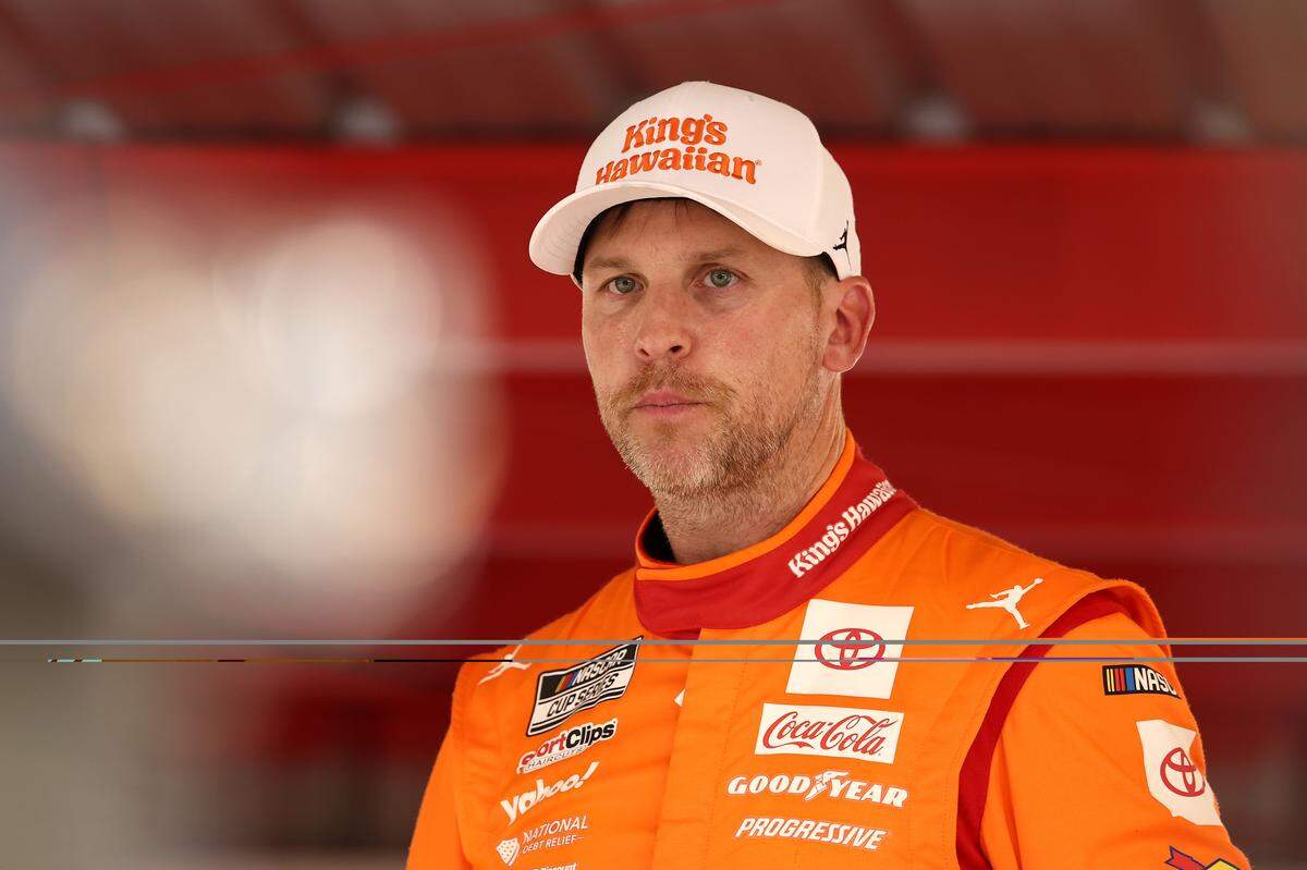 Denny Hamlin looks on from the garage area during the Oct. 26, 2025 running of the NASCAR Cup Series Xfinity 500 at Martinsville Speedway.