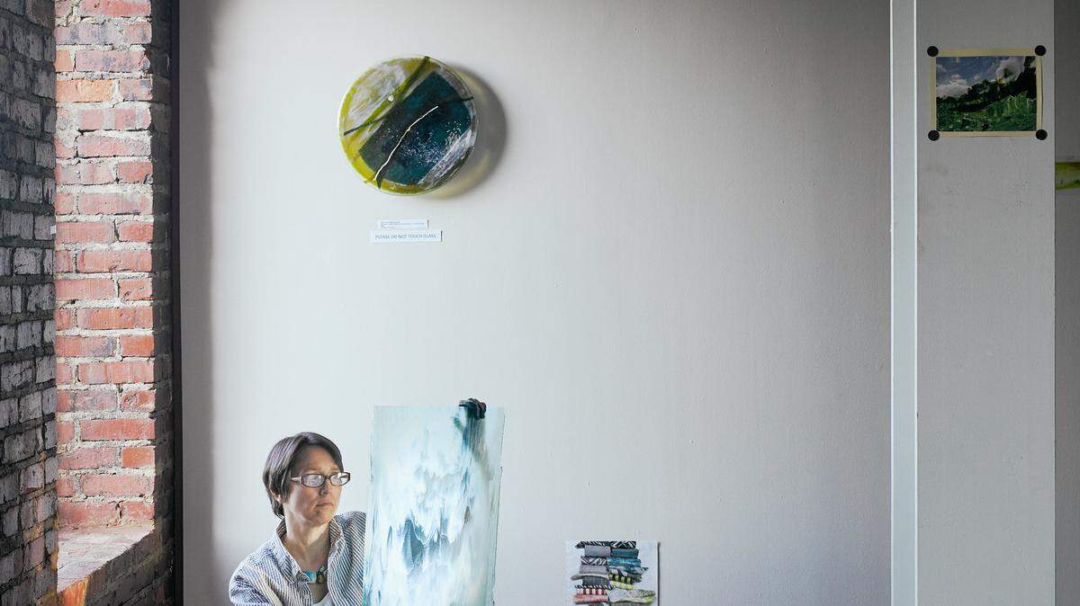 Artist-in-residence Carmella Jarvi captured in her McColl Center studio.