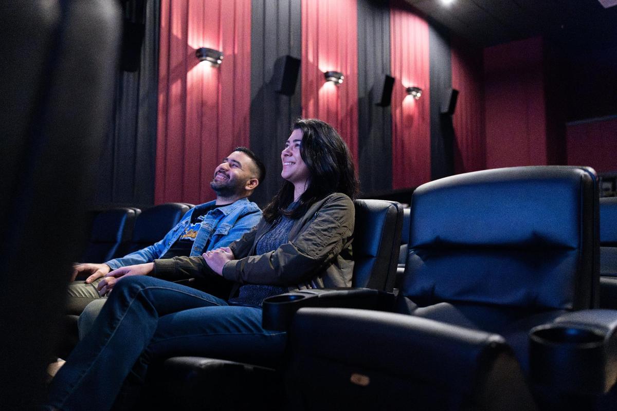 Giovanna Torres and her husband, Alex Piñeres, the couple behind the Charlotte Latino Film Festival, pose for a portrait at the Independent Picture House in Charlotte, N.C., on Friday, March 8, 2024.
