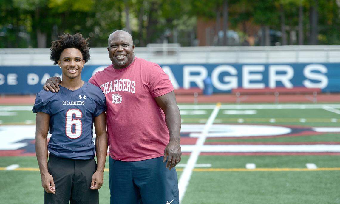Former Washington Commanders star London Fletcher's son, Steele, 17, is a rising junior at Providence Day and a potential star. The Fletchers were rocked last year when Charne Fletcher, London's wife and Steele's mom died 7 days before her 50th birthday. They were buoyed by all the support received from the school community. Steele, who expects to play wide receiver and return punts and kick offs, got a tattoo of his mother in addition to a poem he wrote on his right leg. The Fletchers were photographed on Wednesday, August 20, 2025.
