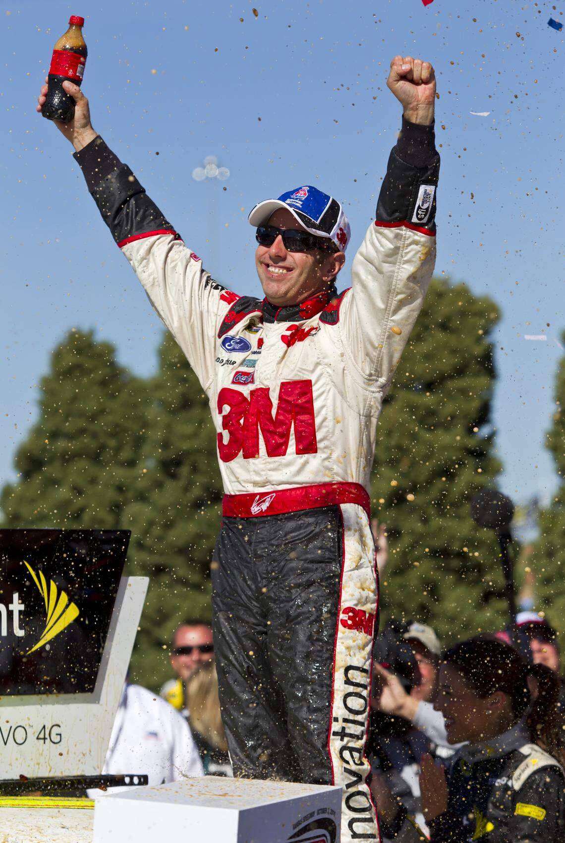 Greg Biffle celebrating a win at the Kansas Speedway.