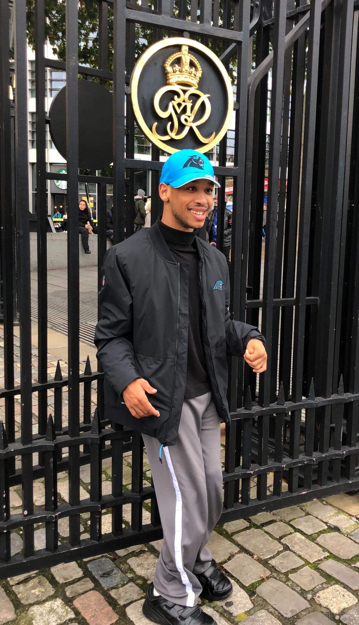Chancellor Lee Adams, the son of former Carolina Panther Rae Carruth, poses for a photo in London in October 2019. Adams, who suffers from brain damage and cerebral palsy due to his traumatic birth, will turn 20 in November and is scheduled to graduate from high school in May.