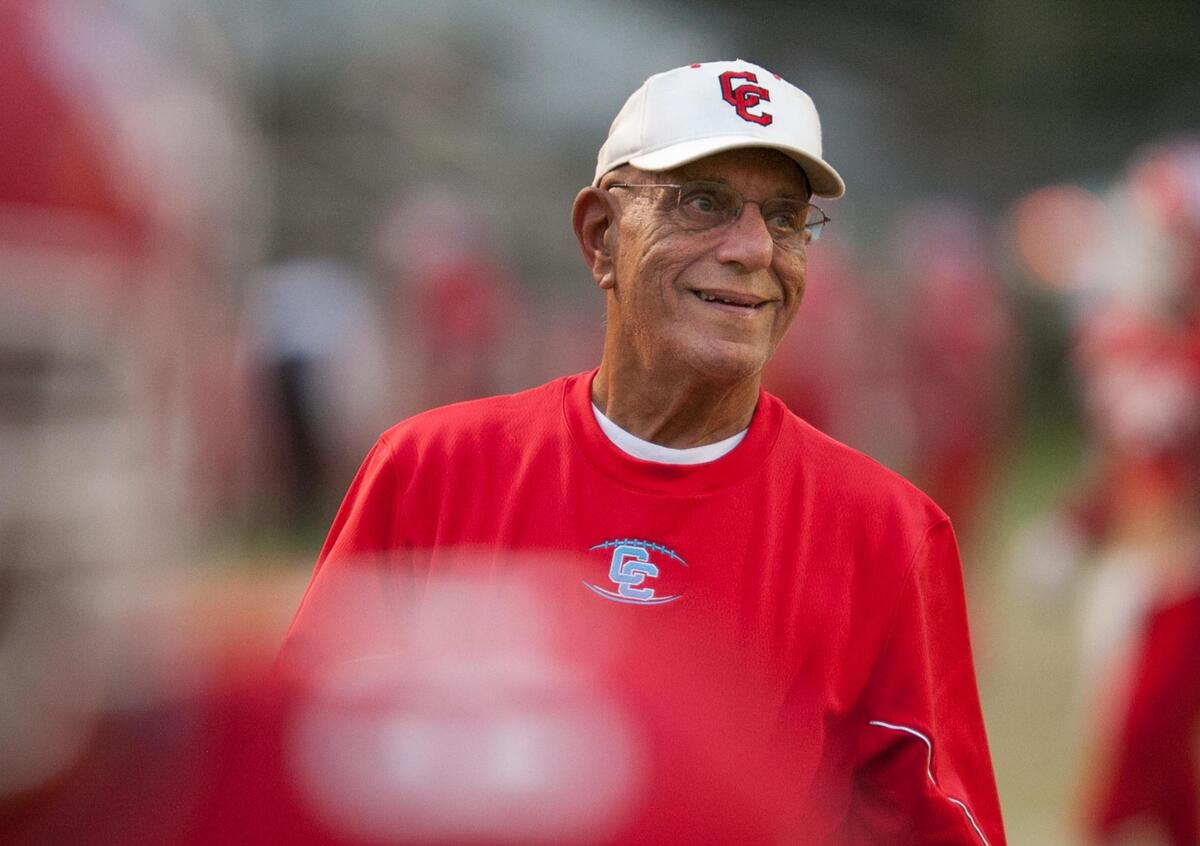 Charlotte Catholic head coach Jim Oddo smiles as his team warms up before facing Olympic High at a SoMeck 4A prep football game at Charlotte Catholic High School Friday, October 11, 2013. Photo by JASON E. MICZEK - Special to the Observer