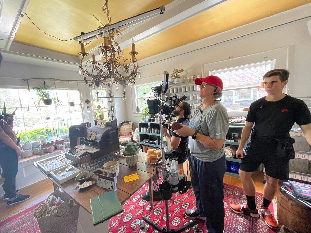 Film crews take over Moxie Mercantile on Commonwealth Avenue in Charlotte to shoot a romantic comedy.