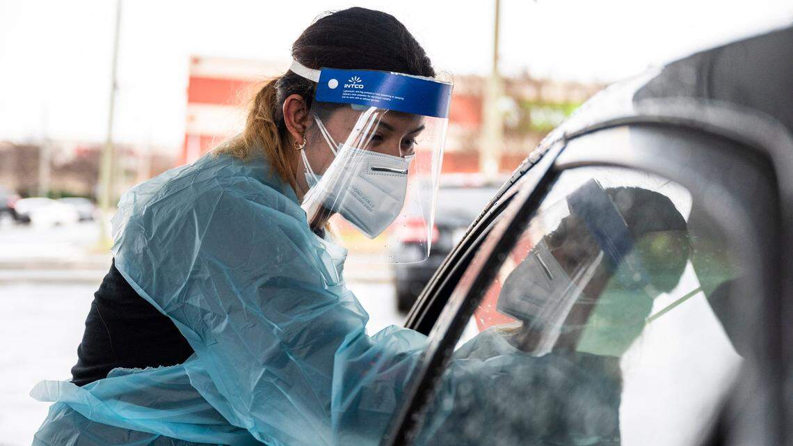 Certified Medical Assistant Marisol Cruz administers a COVID-19 test at StarMed Healthcare.