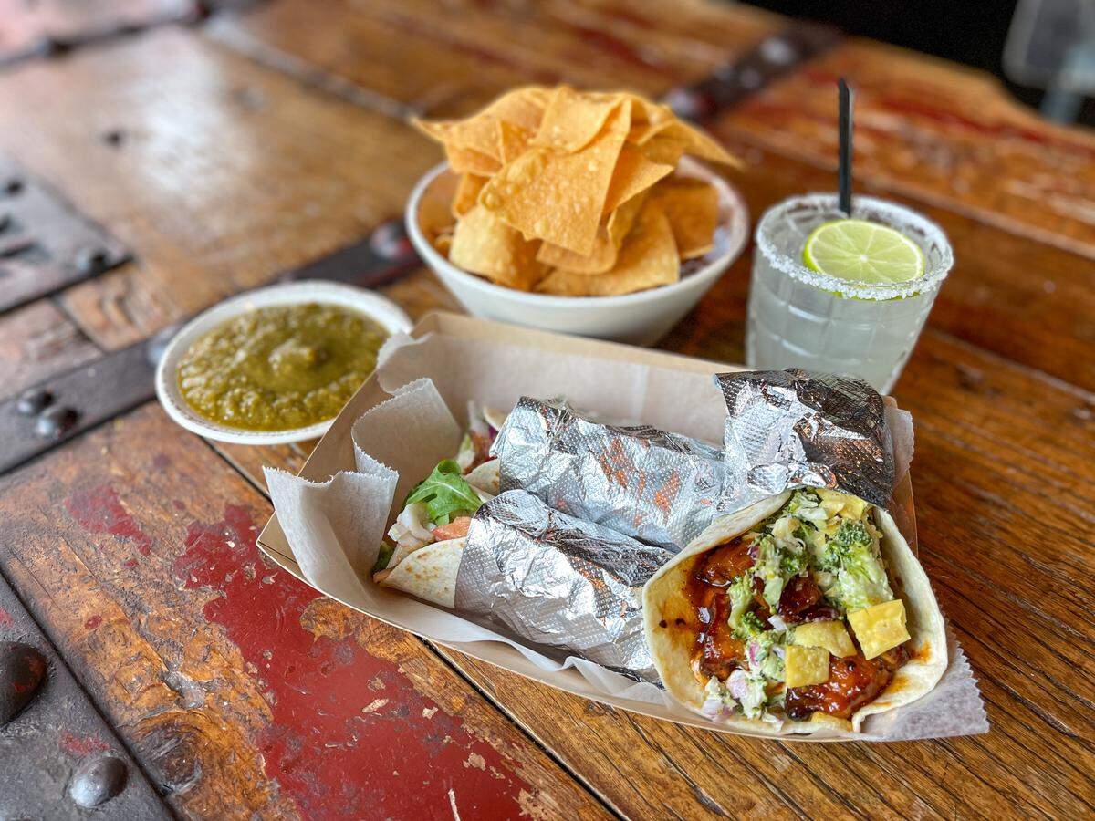 Growlers Pourhouse is now offering a weekly Taco Tuesday, with a Carnitas Taco and a special taco of the day in addition to Pork Belly and Fried Chicken tacos. Guests can enjoy their choice of three tacos for just $12. Pair them with a Classic Margarita ($8).
