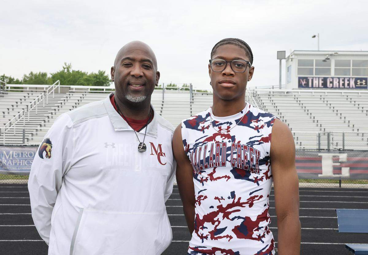 Mallard Creek track coach Samuel Willoughby with standout Nyan Brown Monday, May 11, 2026 at the school.