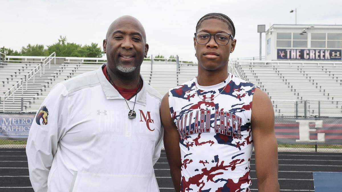 Mallard Creek track coach Samuel Willoughby with standout Nyan Brown Monday, May 11, 2026 at the school.