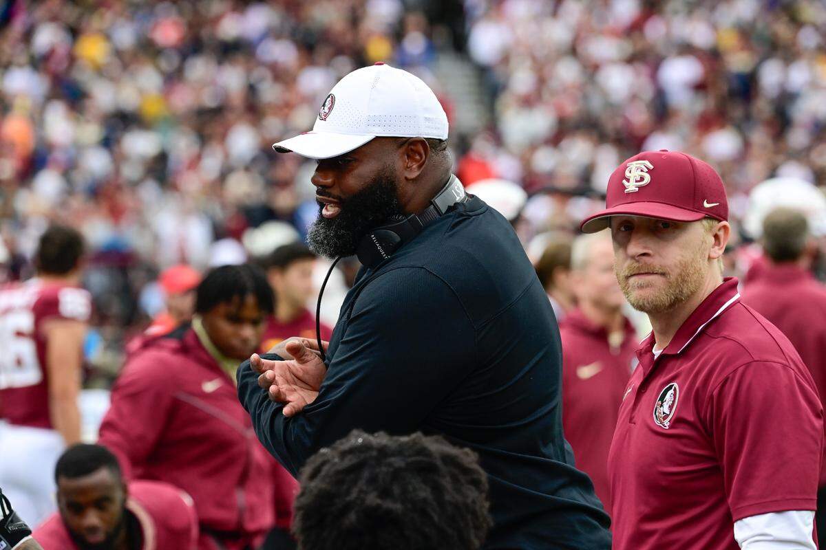 Former Florida State offensive coordinator Alex Atkins speaks to the team during a 2023 game at Boston College. Eric Canha-USA TODAY Sports