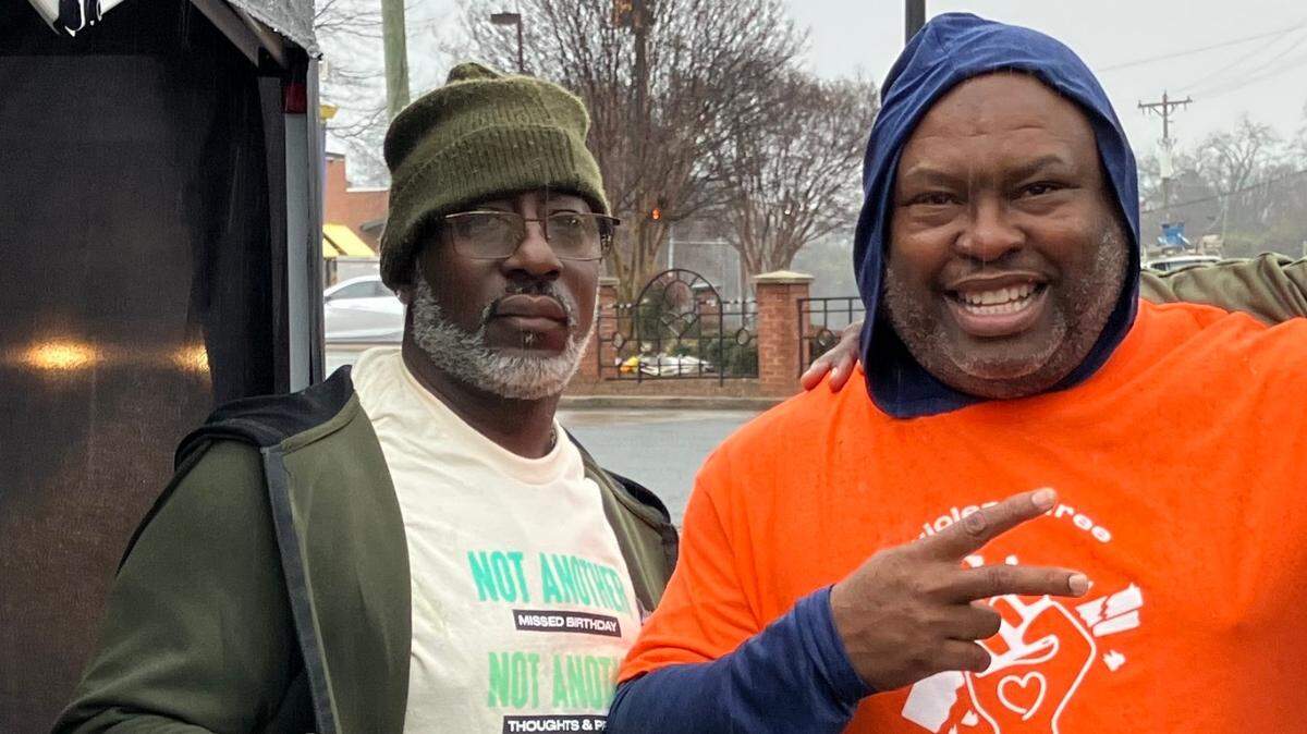 Donnell Gardner, left, with Beatties Ford Road Site Supervisor Roosevelt Brooks.