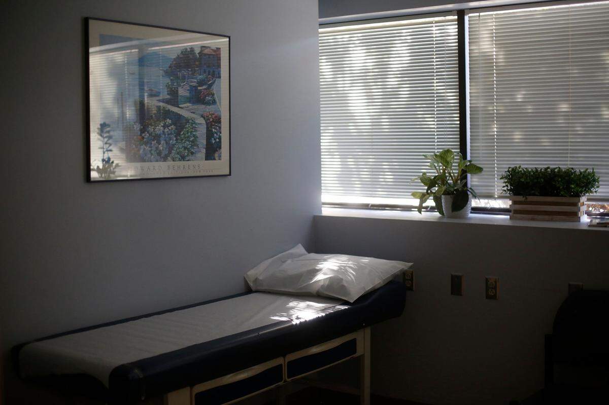 Dr. Andrew Bush received $300,000 in federal covid relief aid for his Sanford-based practice. Although the aid helped him meet payroll for his 13 employees, he says, it did not cover losses from canceled surgeries and office visits.