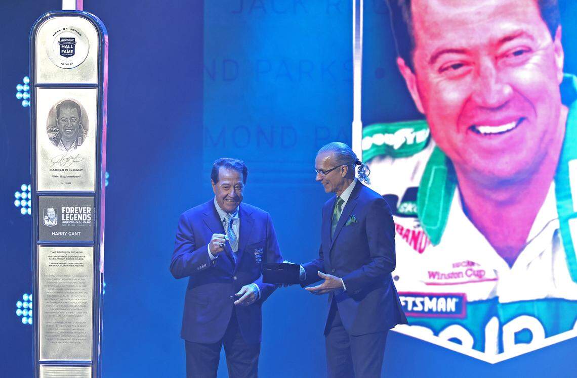 Former NASCAR driver Harry Gant, left, proudly displays his NASCAR Hall of Fame ring with Kyle Petty, right, during the NASCAR Hall of Fame Induction Ceremony at the Charlotte Convention Center in Charlotte, NC on Friday, January 23, 2026. 
