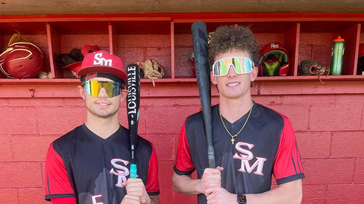 South Mecklenburg junior Brayden Bartholomew (left) and senior Chris Short will lead the Sabres against rival Charlotte Catholic Saturday. Proceeds from the game will prevent a charity for kids with special needs