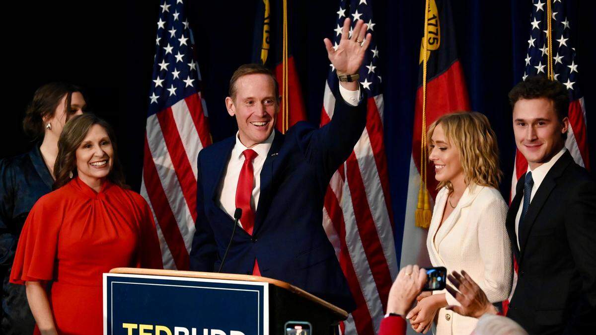 Rep. Ted Budd waves to supporters as he and his family celebrate his victory over Cheri Beasley for the U.S. Senate on Tuesday, November 8, 2022.