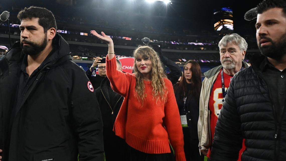 Taylor Swift (center) walks off the field after the Kansas City Chiefs won the Jan. 28, 2024 AFC Championship football game against the Baltimore Ravens at M&T Bank Stadium.