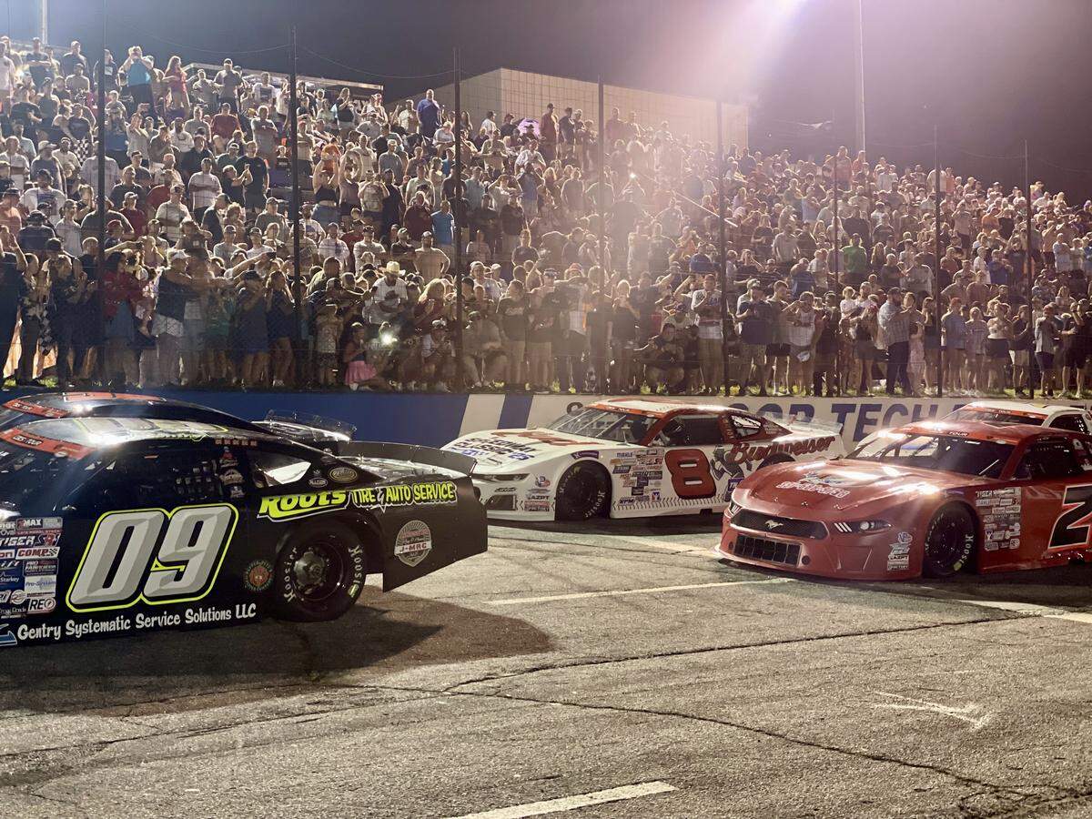 Dale Earnhardt Jr., in the red No. 8 Budweiser paint scheme, waits for the green flag ahead of the late model stock car race by the CARS Tour on Saturday, August 16, 2025, at Anderson Motor Speedway.