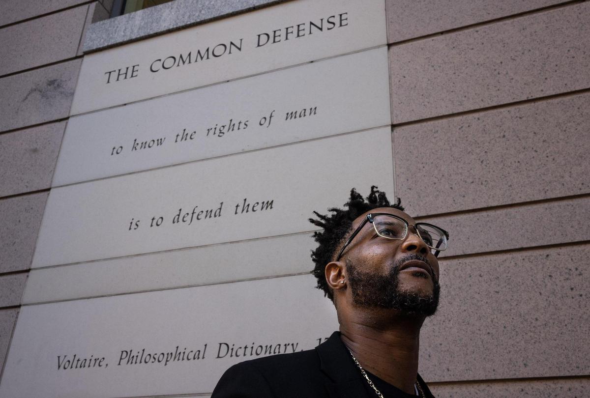Kenny Robinson in front of the Mecklenburg County Courthouse in Charlotte, on Nov. 18, 2021. Inside a courtroom in October, Robinson rallied supporters to help convince a judge that a young man charged with robbery deserved a second chance.