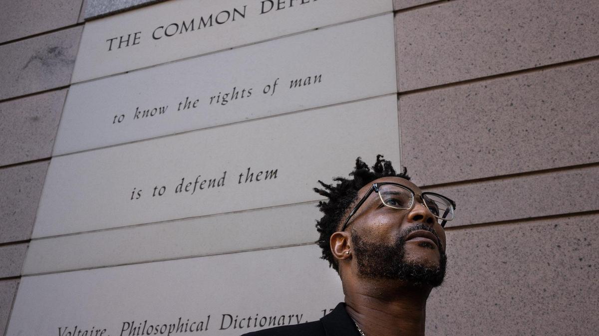 Kenny Robinson in front of the Mecklenburg County Courthouse in Charlotte, on Nov. 18, 2021. Inside a courtroom in October, Robinson rallied supporters to help convince a judge that a young man charged with robbery deserved a second chance.