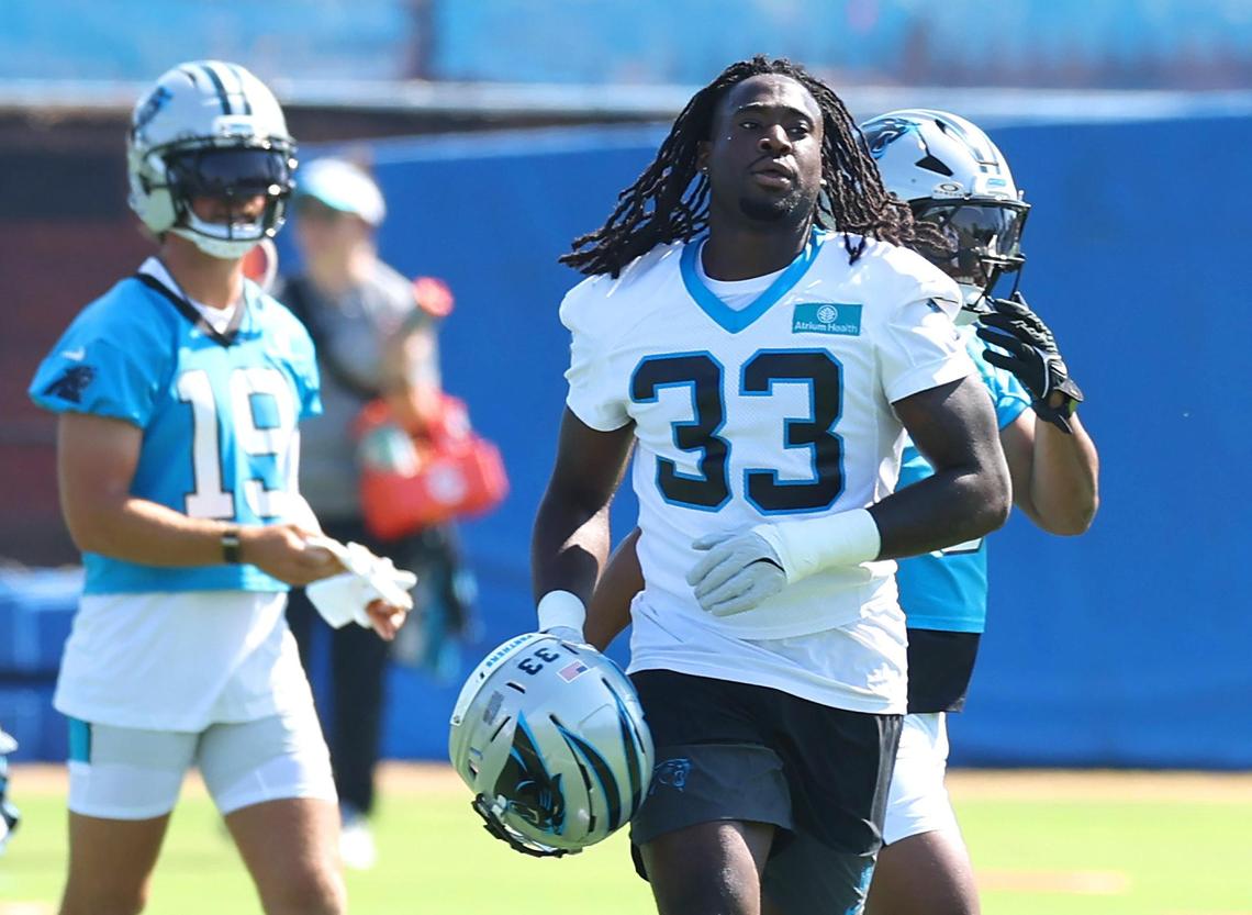 Carolina Panthers linebacker Princely Umanmielen jogs up the field to join his teammates during a training camp practice on Wednesday, July 23, 2025.