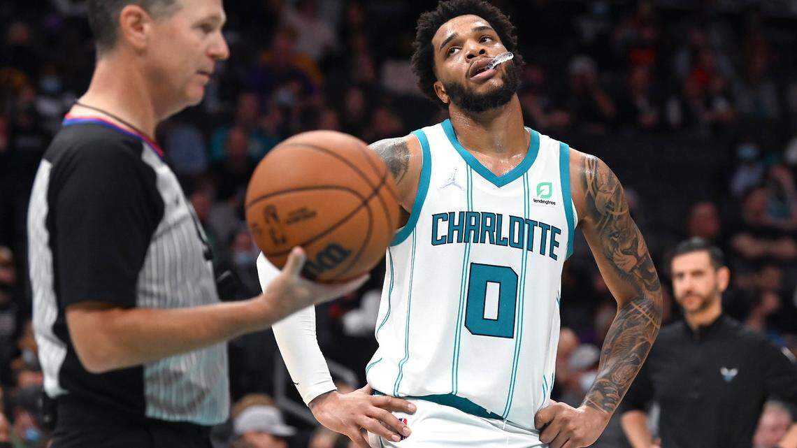 Charlotte Hornets forward Miles Bridges, center, is frustrated with a foul call during second half action against the Cleveland Cavaliers at Spectrum Center in Charlotte, NC on Monday, November 1, 2021.