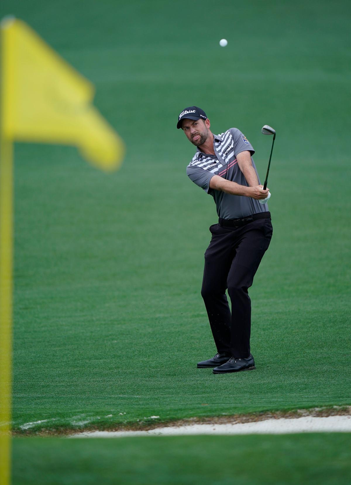 Charlotte's Webb Simpson rockets up the leader board with a 64  during the third round of the Masters (AP Photo/David J. Phillip)