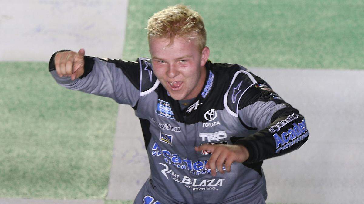 Tyler Ankrum celebrates after winning the NASCAR Truck Series race at Kentucky Speedway in Sparta on Thursday. Ankrum, 18, graduated from Lake Norman High School in June.