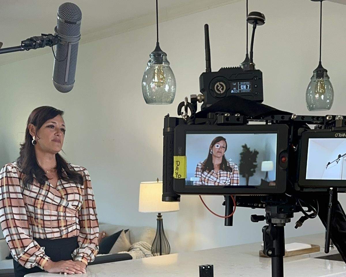 Veronica Diquez, a Charlotte real estate broker filming for an episode of “House Hunters” on HGTV.