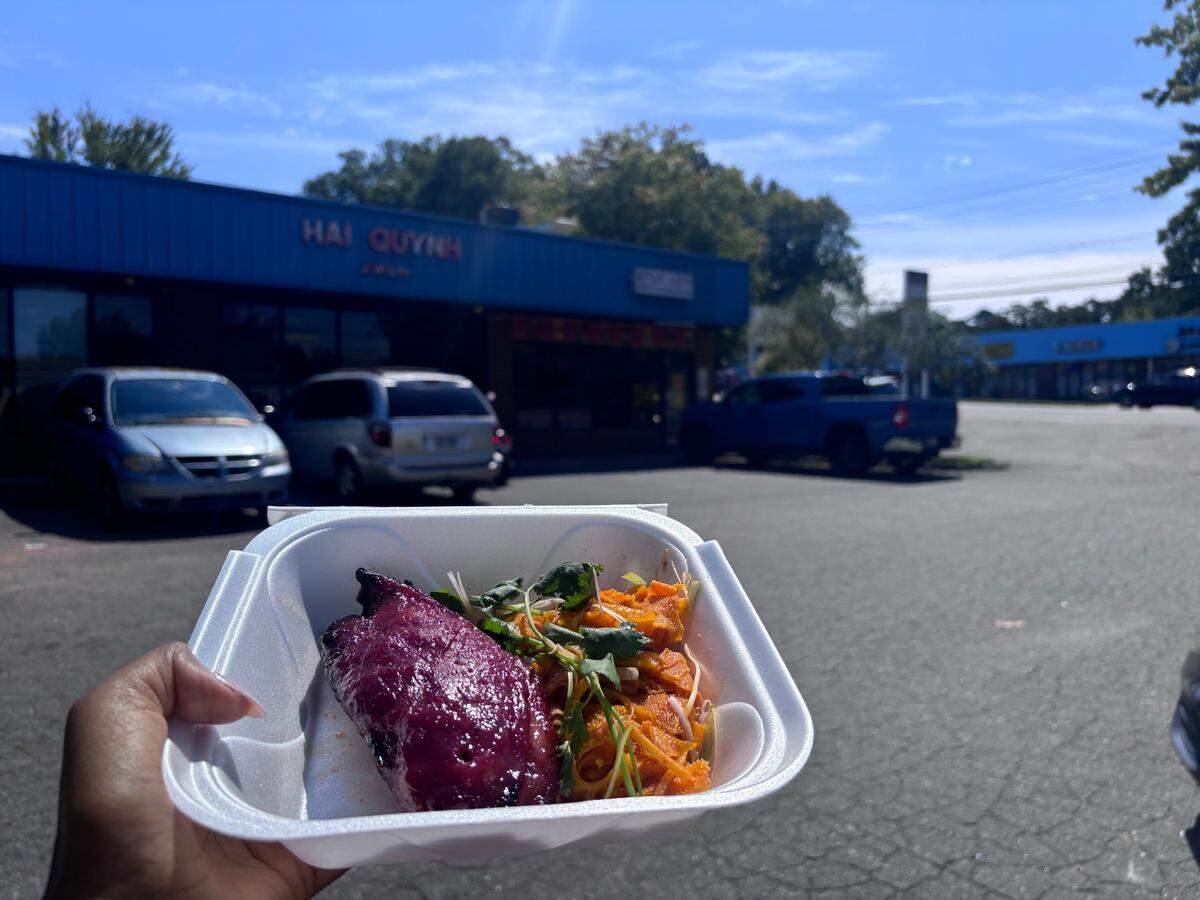 Van Loi Chinese Barbecue, an Asian restaurant with traditional Chinese and Vietnamese foods such as whole roasted ducks, has reopened after closing for renovations. Shown here is a to-go plate of barbecue pork paired with tripe.