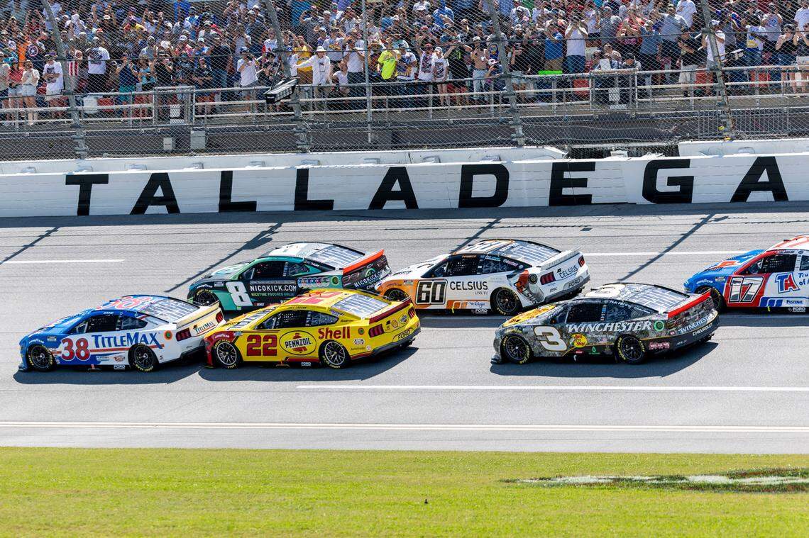 Apr 27, 2025; Talladega, Alabama, USA; NASCAR Cup Series drivers Zane Smith (38) and Kyle Busch (8) battle for an early lead during stage one of the NASCAR: Jack Link’s 500 at Talladega Superspeedway.
