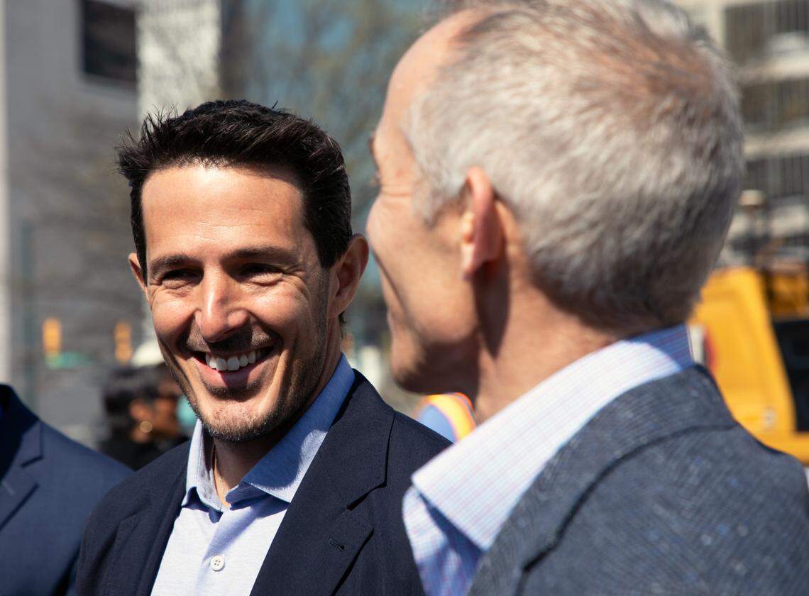 Co-owners of the Charlotte Hornets Gabe Plotkin (left) and Rick Schnall express excitement about the city’s approval of the team’s practice facility at the groundbreaking on March 27, 2025. 