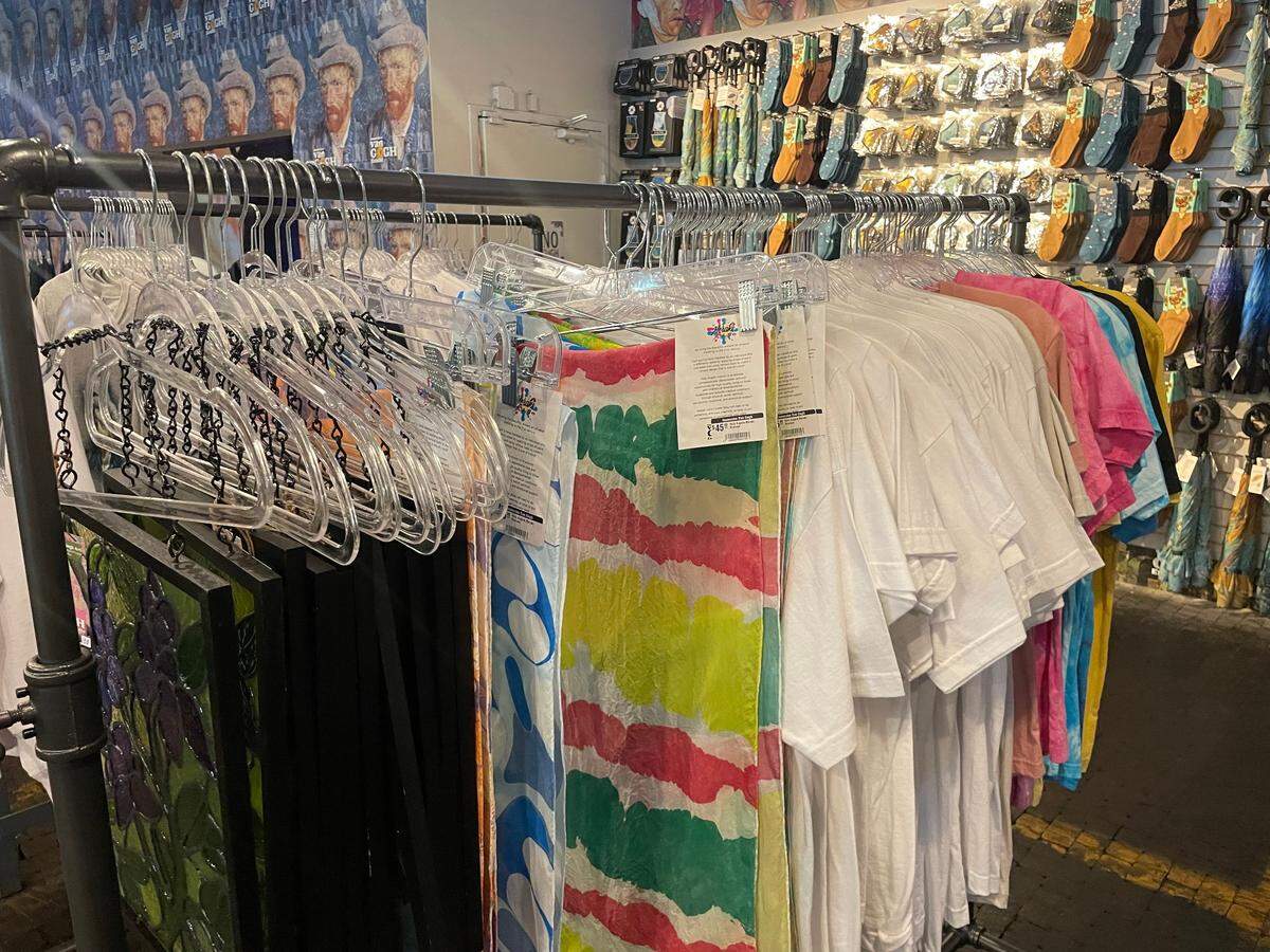 Scarves and other goods made by Holy Angels residents are available for sale in the Immersive Van Gogh gift shop.