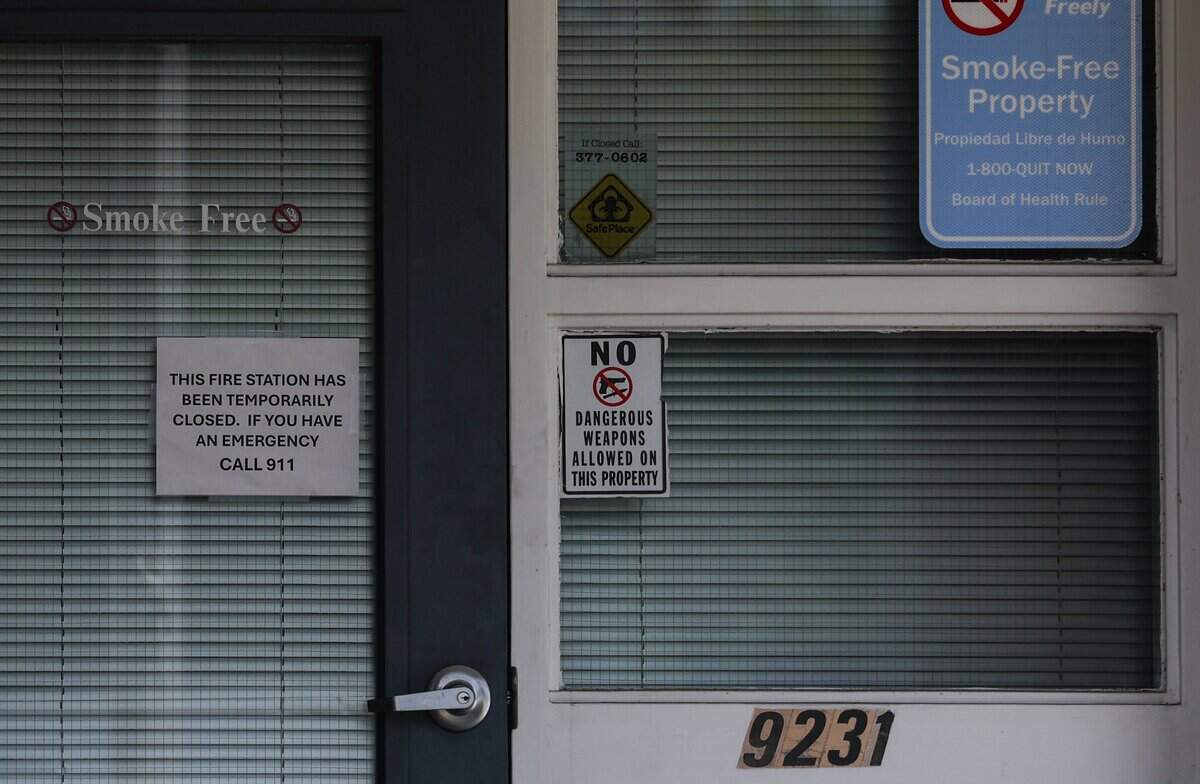 A sign on the door of fire station 26 alerts people to the fact it is temporaryily closed in Charlotte on Thursday, May 28, 2026. The station was evacuated due to mold.