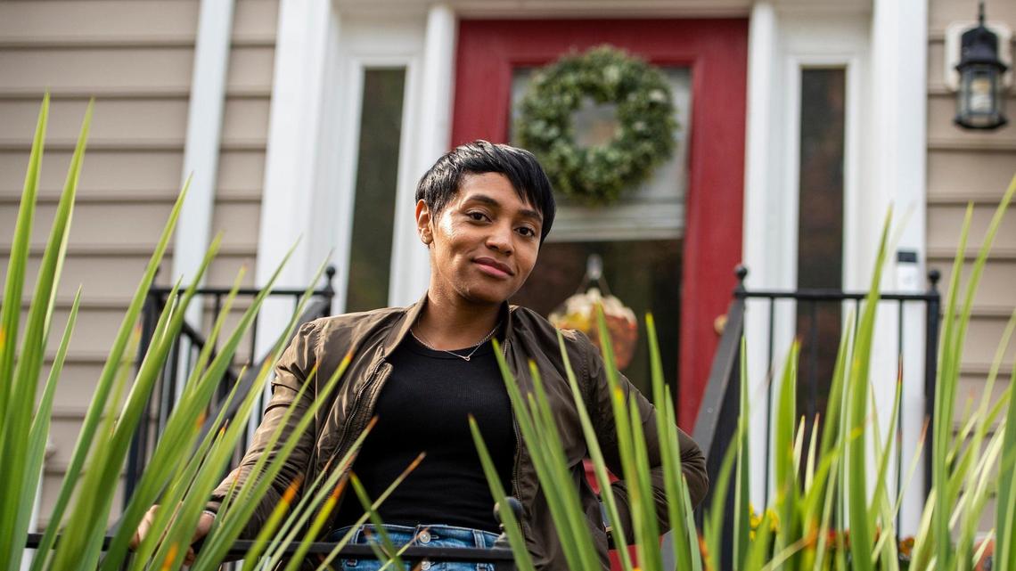 Keri Miller outside her home on Oct. 1, 2021 in Charlotte. Miller led the charge to change her townhouse community’s covenant to restrict renting by investors. It’s one of several HOAs in the Derita/University area that has made, or is considering, similar changes. 