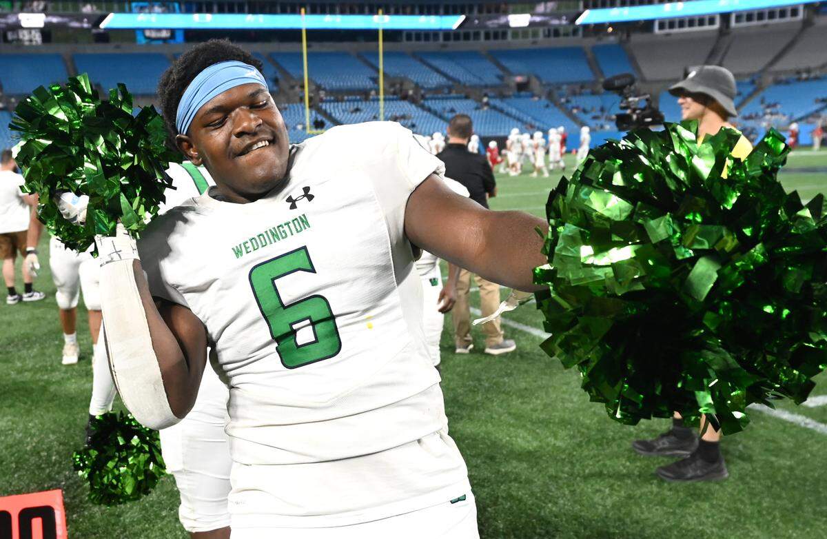 Weddington Warriors defensive lineman Aiden Harris celebrates the team’s 13-7 victory over Providence Day on Thursday, August 22, 2024, at Bank of America Stadium. Both teams competed in the Keep Pounding High School Classic.
