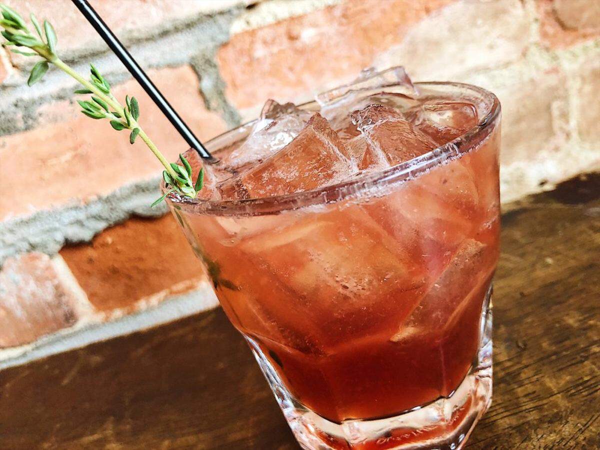 Growlers Pourhouse’s Pomegranate Thyme Gin & Tonic.