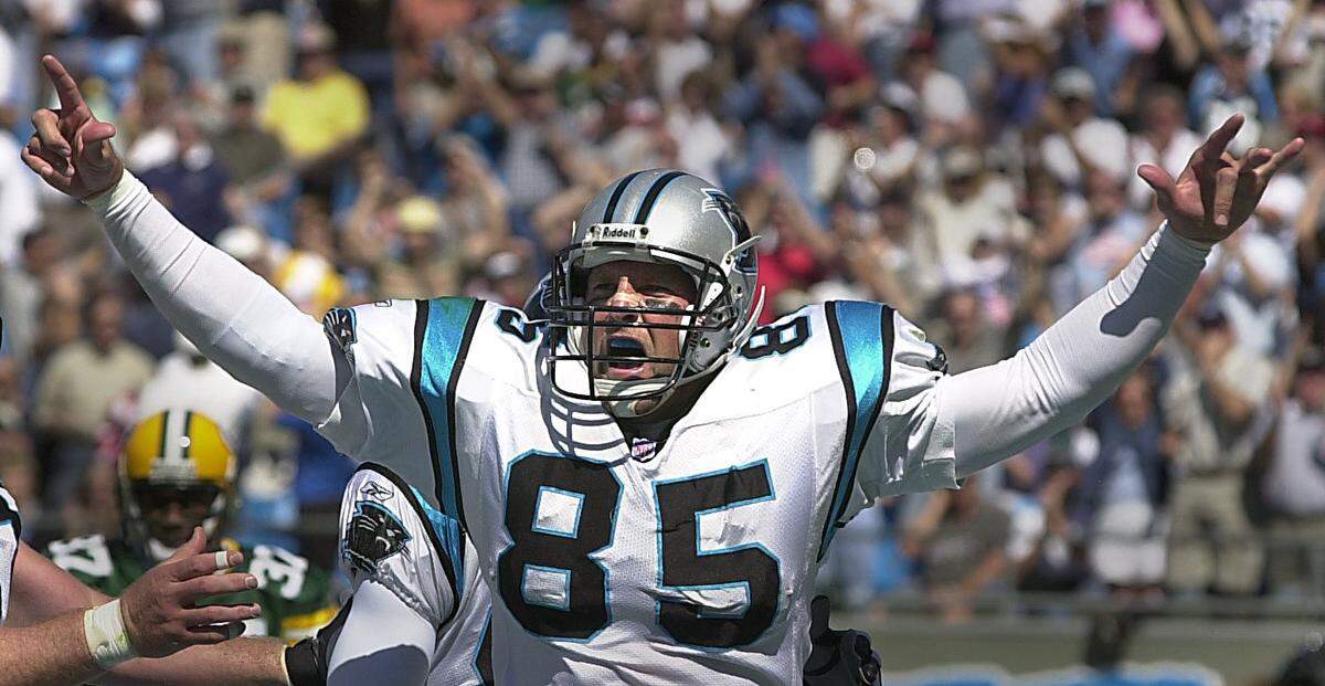 Panthers tight end Wesley Walls celebrates after a score. Walls, who joined Carolina in 1996, made the Pro Bowl five times as a Panther.