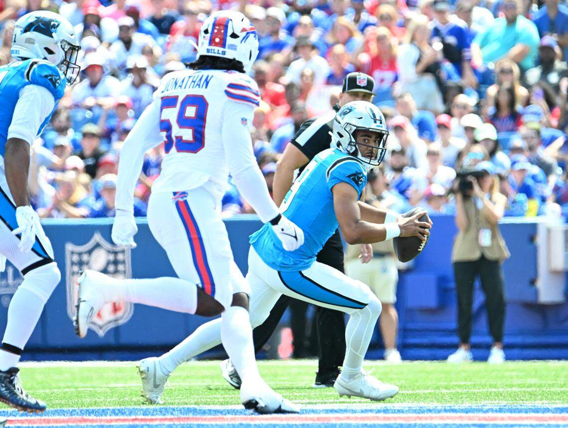 Carolina Panthers quarterback Bryce Young runs out of the pocket against Buffalo. Young scrambled effectively in his lone drive Saturday, including on a 4th-and-3 conversion where he ran left and threw left to new wide receiver Diontae Johnson.