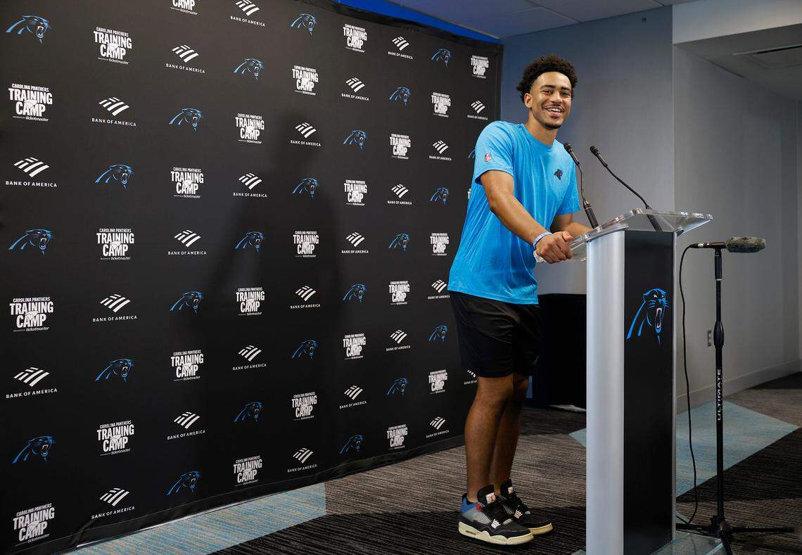 Carolina Panthers quarterback Bryce Young jokes with members of the media prior to a press conference on Tuesday. Young’s Panthers went 2-15 during his inaugural season in 2023.