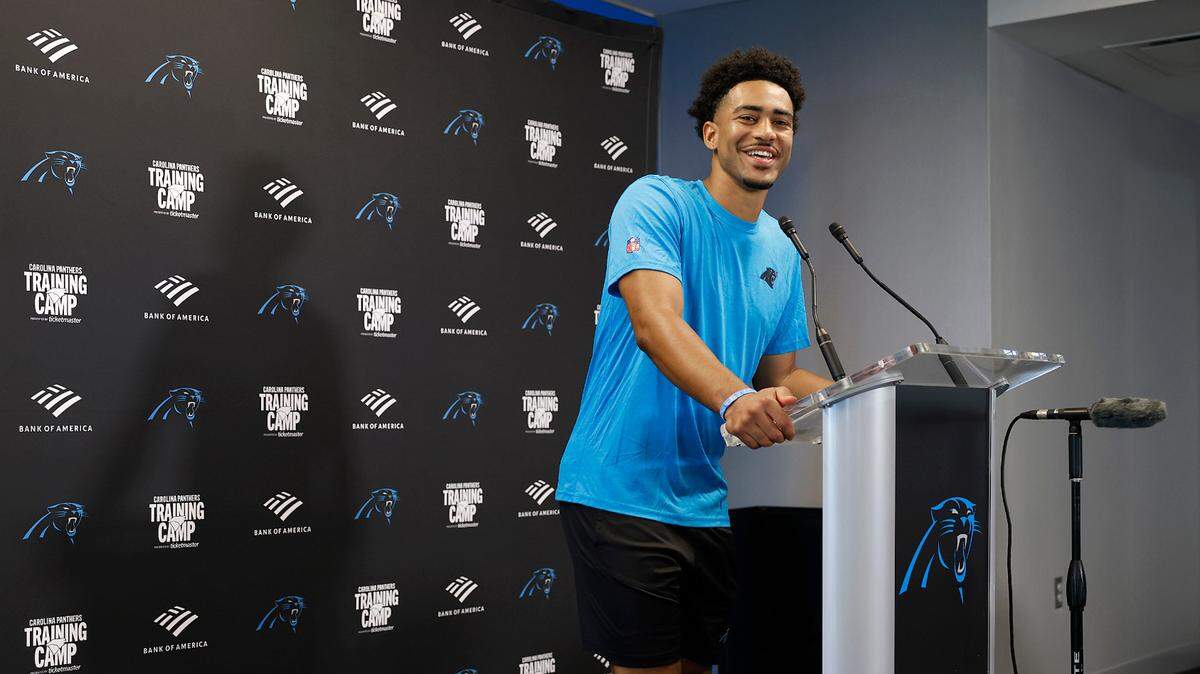Carolina Panthers quarterback Bryce Young jokes with members of the media prior to a press conference on Tuesday, July 23, 2024 at Bank of America Stadium in Charlotte, NC. The team is hosting training camp in Charlotte, NC this year after leaving Spartanburg, SC.