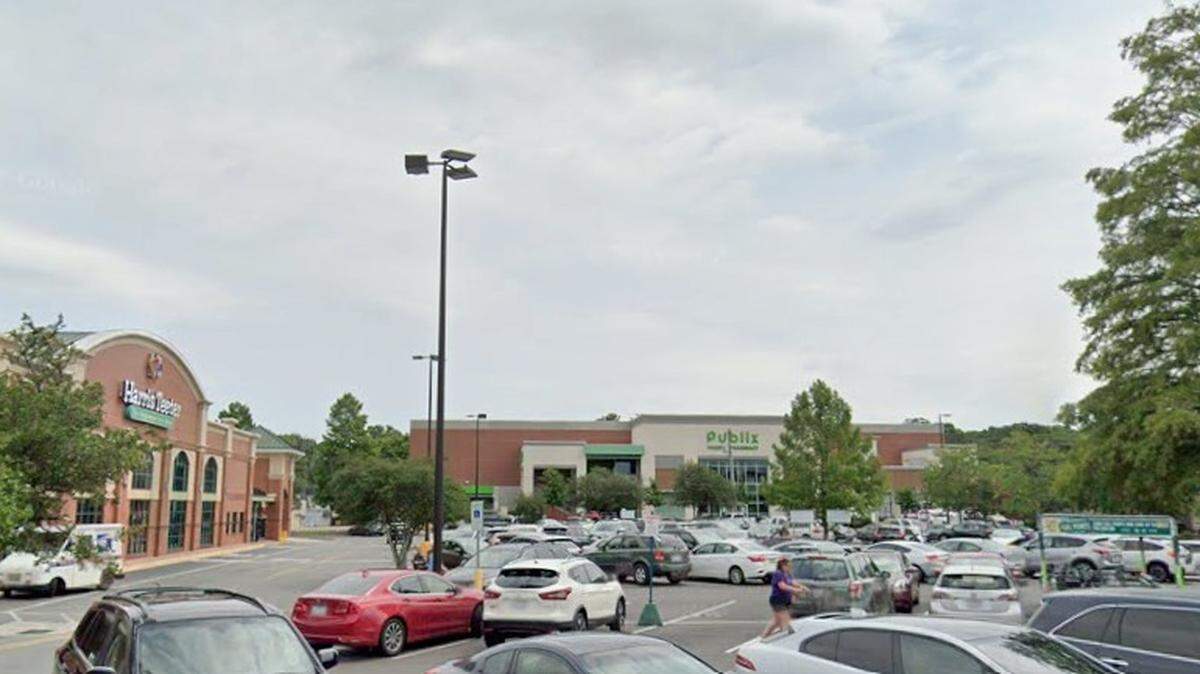 Police are searching for the woman who stabbed a pregnant woman outside Harris Teeter in the Cotswold Village shopping center in Charlotte.