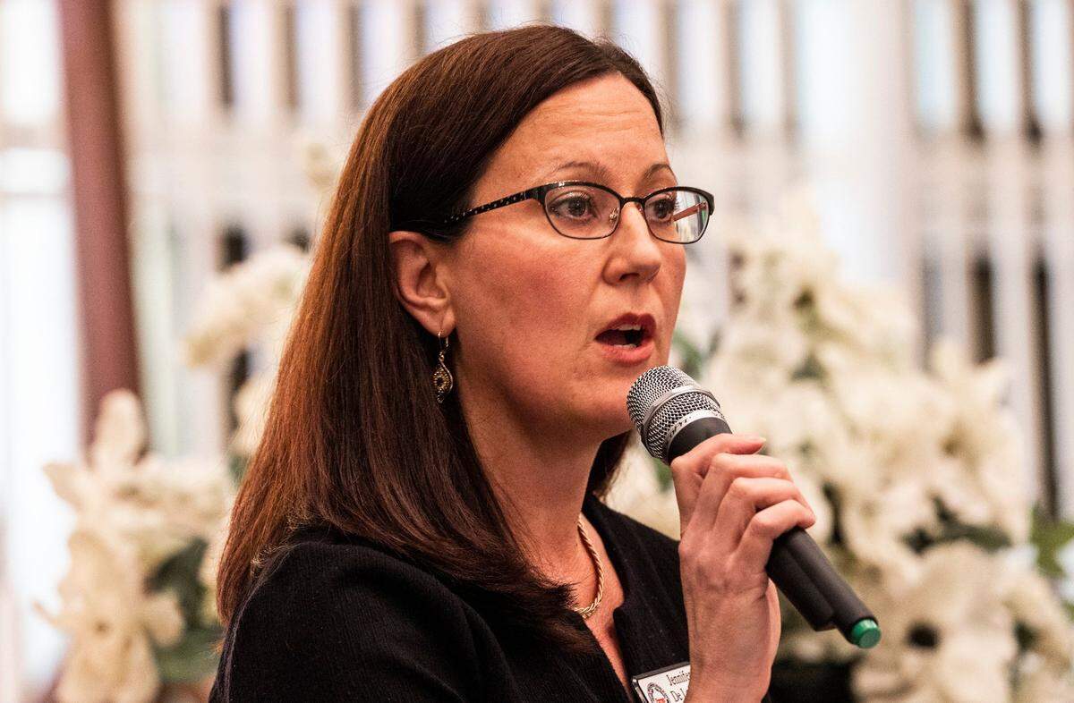 Jennifer De La Jara speaks during the Black Political Caucus’ forum for county commissioner candidates at C N Jenkins Memorial Presbyterian Church on Thursday, March 31, 2022 in Charlotte. 