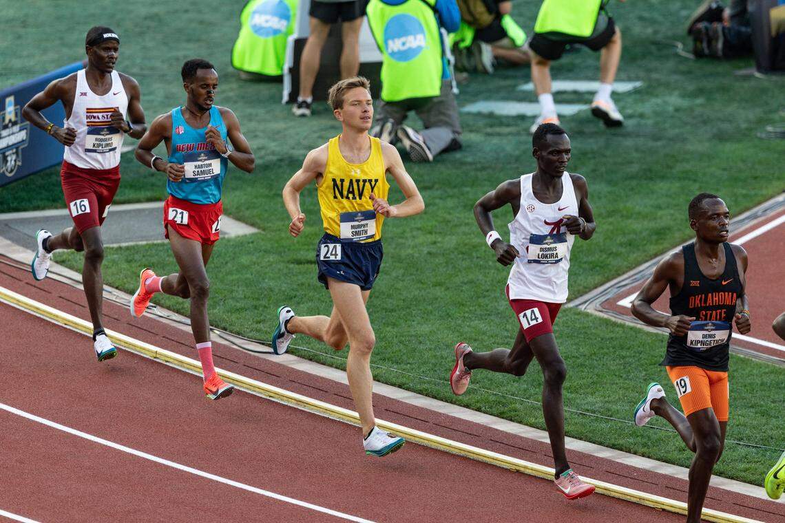 Murphy Smith, center, photographed at the 2025 NCAA Outdoor Track and Field Championships, where he finished 13th in the 10-kilometer final.