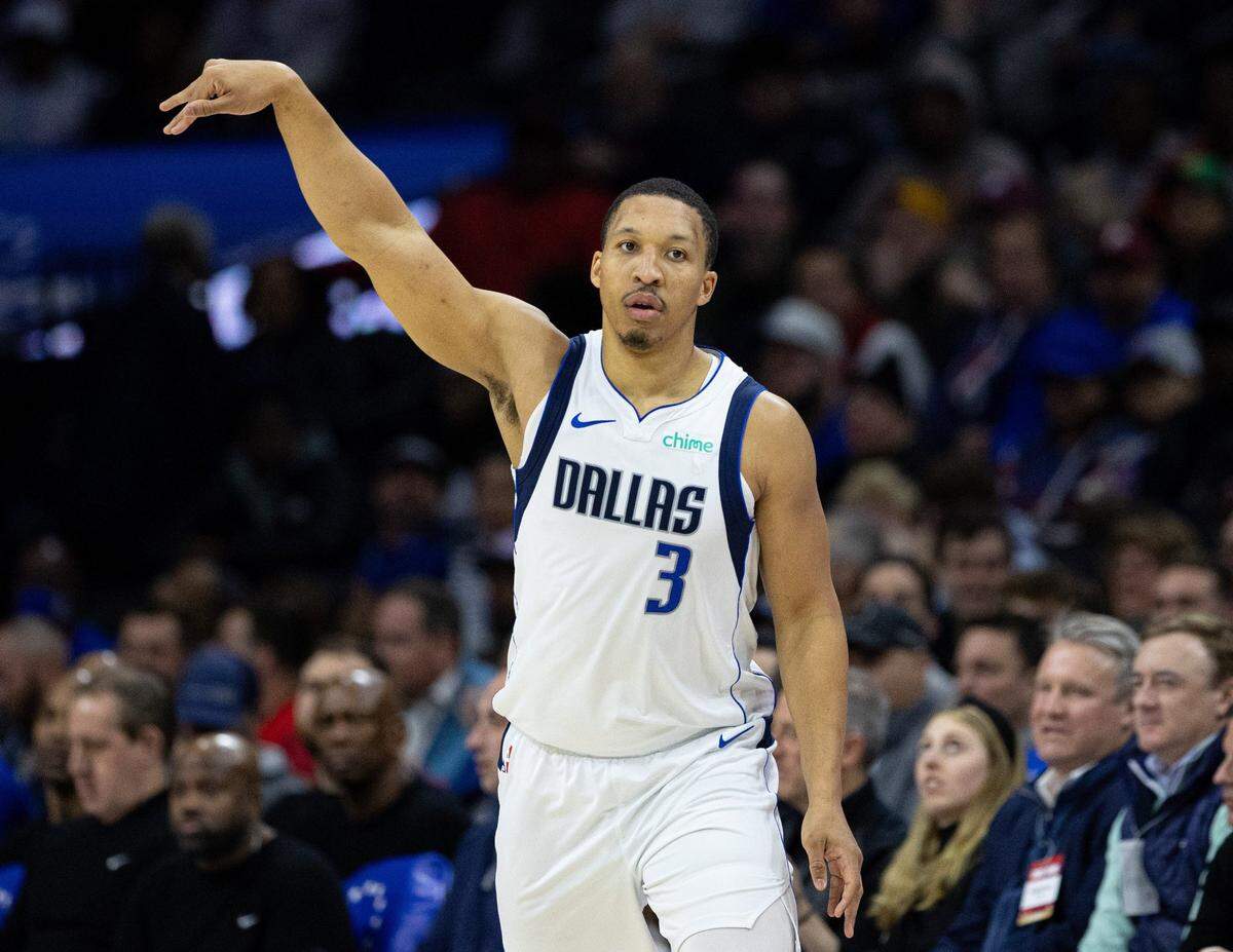 Grant Williams (3) reacts to his three pointer against the Philadelphia 76ers. Dallas traded him to Charlotte before Thursday's deadline.
