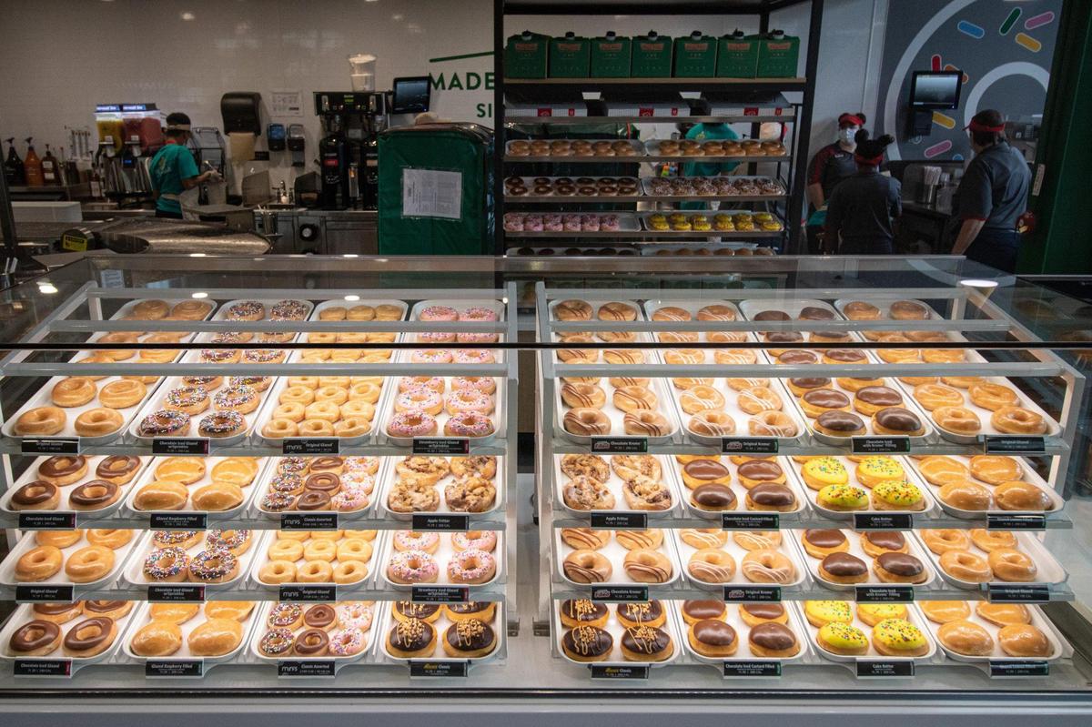 Onlookers can watch the donuts being made from start to finish at the new Krispy Kreme on Hawkins Street.