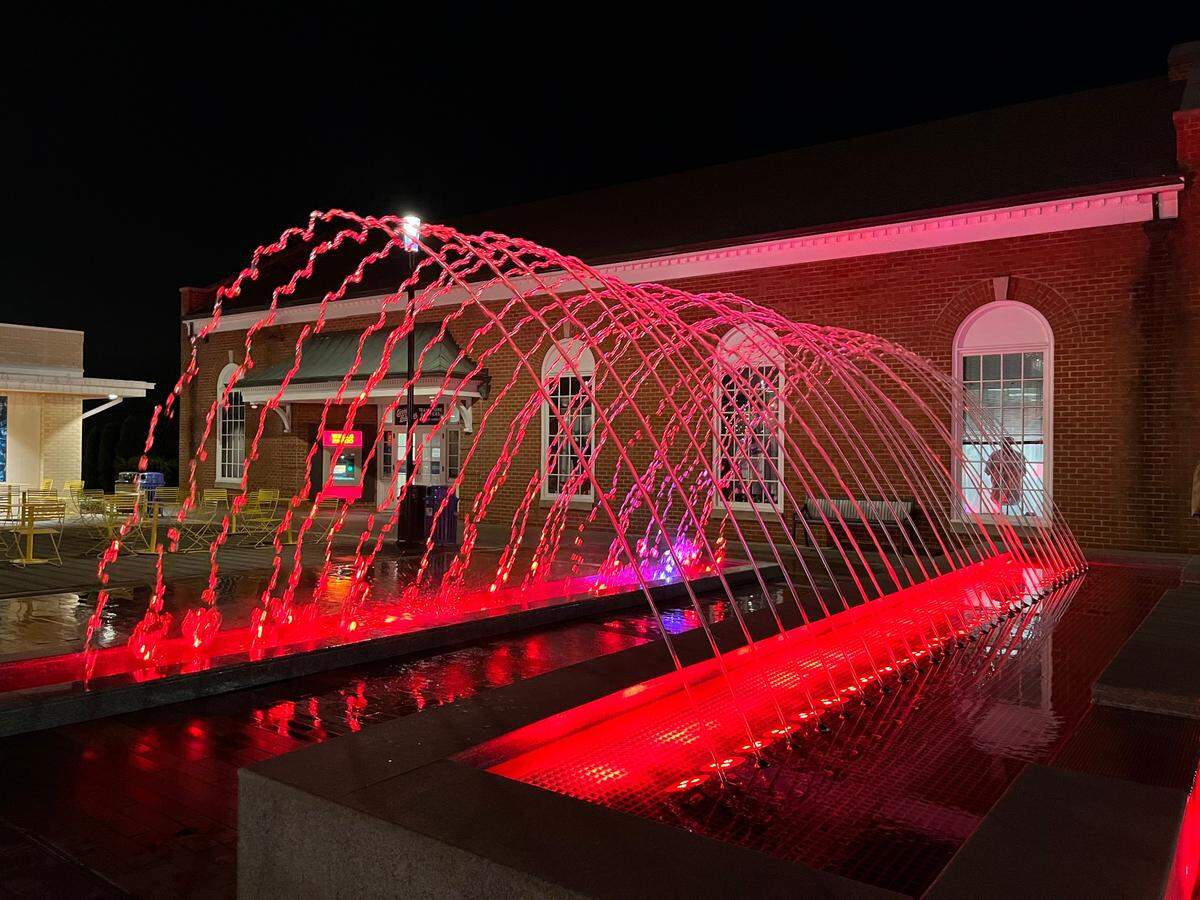 Walk through an illuminated fountain in downtown Kannapolis.