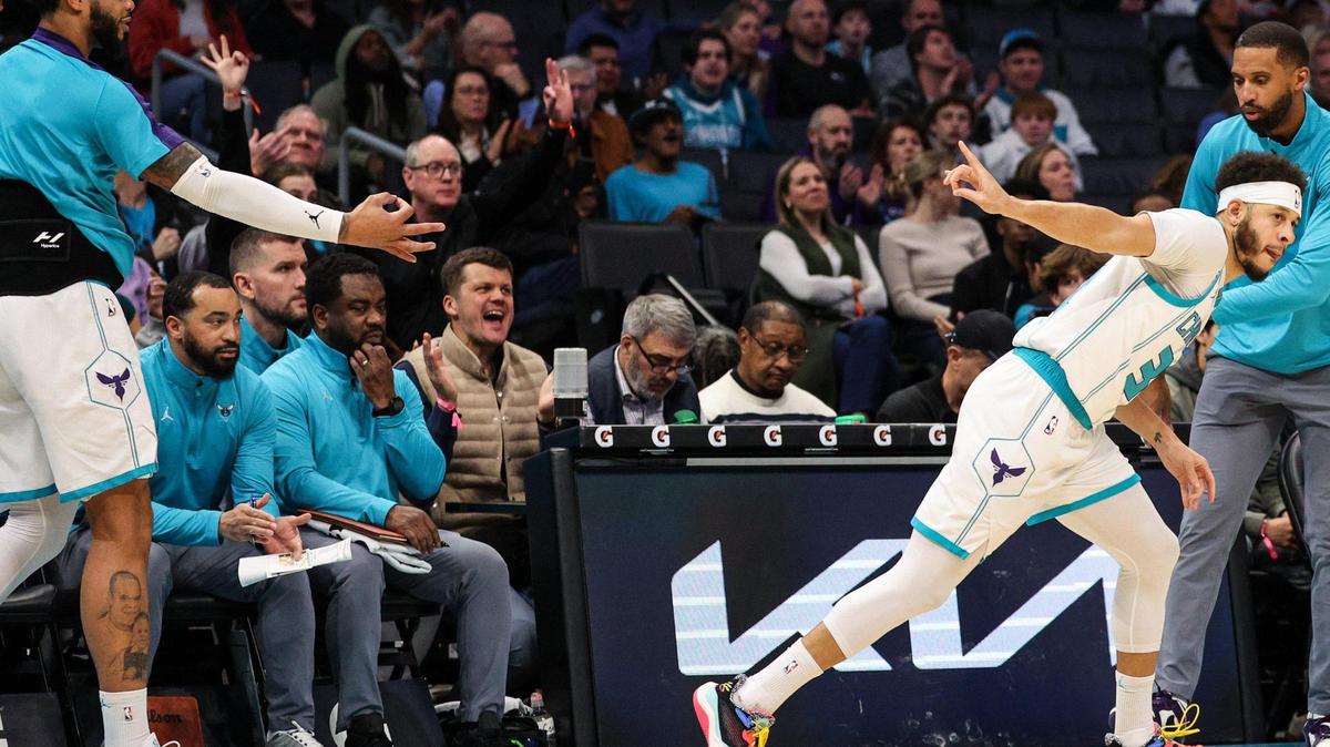 Hornets forward Miles Bridges, far left, celebrates with guard Seth Curry, far right, after Curry shot for three points during the game against the Nets at Spectrum Center in Charlotte, NC on Wednesday, January 29, 2025.